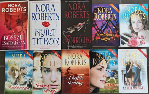 Nora Roberts: (10 db) Nora Roberts romantikus könyvcsomag: A bosszú csapdájában / Nyílt titkok / Forró jég / Nem teljesen idegen / A lezáratlan ügy / Határtalan vágy / Nézd meg az anyját! / A kétféle törvény / A játék szabálya / Egy házban az ellenséggel antikvár