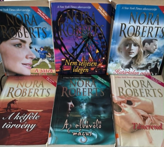 Nora Roberts: Nora Roberts könyvcsomag (6 darab) A játék szabálya; Nem teljesen idegen; A kétféle törvény; Az elbűvölő mágus; Táncrend; Határtalan vágy antikvár
